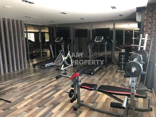 Меблированная квартира 1+1 в резиденции с отельной инфраструктурой в Махмутларе, 50 кв.м. - Ракурс 45