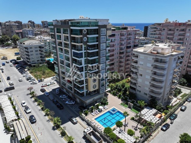 Меблированная квартира 1+1 в резиденции с отельной инфраструктурой в Махмутларе, 50 кв.м. - Ракурс 48