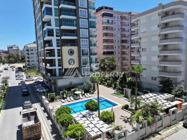 Меблированная квартира 1+1 в резиденции с отельной инфраструктурой в Махмутларе, 50 кв.м. - Ракурс 49