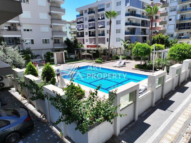 Меблированная квартира 1+1 в резиденции с отельной инфраструктурой в Махмутларе, 50 кв.м. - Ракурс 51