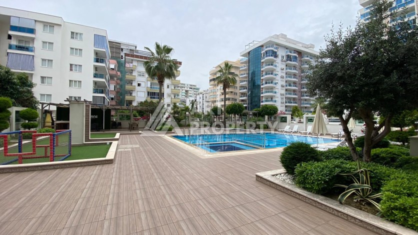 Меблированная квартира 1+1 в резиденции с отельной инфраструктурой в Махмутларе, 50 кв.м. - Ракурс 52