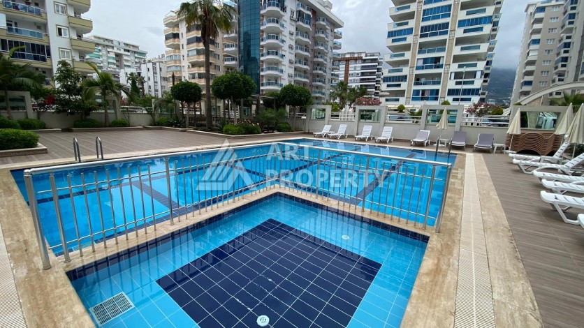 Меблированная квартира 1+1 в резиденции с отельной инфраструктурой в Махмутларе, 50 кв.м. - Ракурс 53