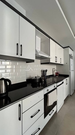 Квартира 1+1 с мебелью в хорошем ЖК, 55 кв.м. Махмутлар, Алания - Ракурс 14