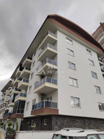 Квартира 1+1 с мебелью в хорошем ЖК, 55 кв.м. Махмутлар, Алания - Ракурс 41
