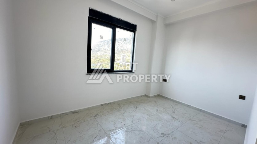 Новая квартира 1+1 в 700 метрах от моря, 50 кв.м. - Ракурс 4