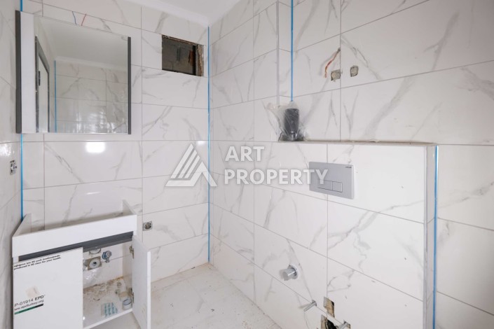 Кварти ра 1+1 в новом доме, 55 кв.м. Махмутлар, Алания. - Ракурс 7