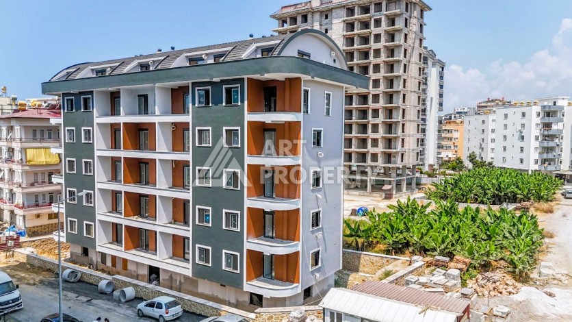 Кварти ра 1+1 в новом доме, 55 кв.м. Махмутлар, Алания. - Ракурс 14
