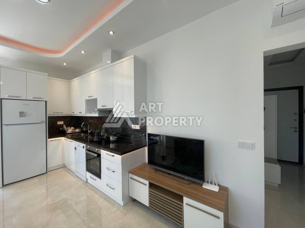 Квартира 1+1 в престижном ЖК, 56 кв.м. Махмутлар, Алания. - Ракурс 10