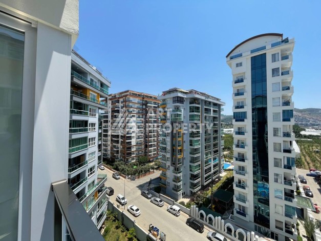 Квартира 1+1 в престижном ЖК, 56 кв.м. Махмутлар, Алания. - Ракурс 19