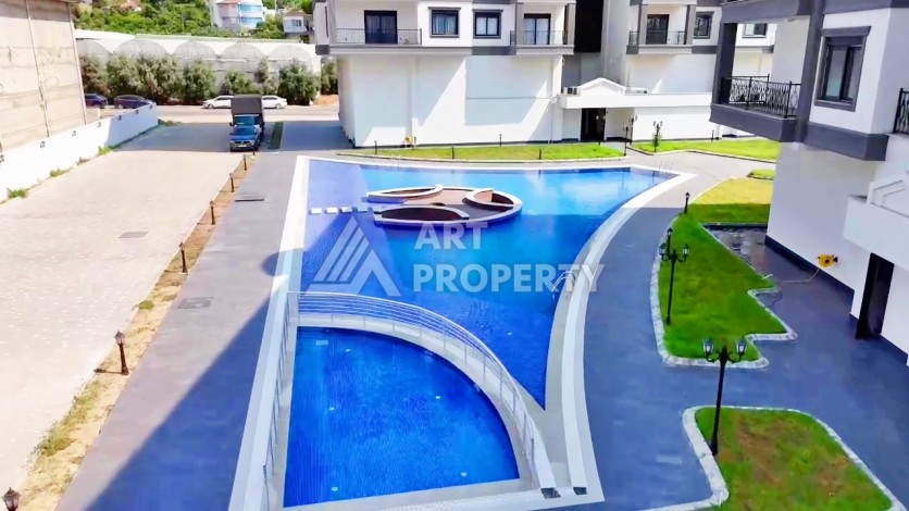 Квартира 2+1 в новом ЖК, 85 кв.м. Каргыджак, Алания - Ракурс 2