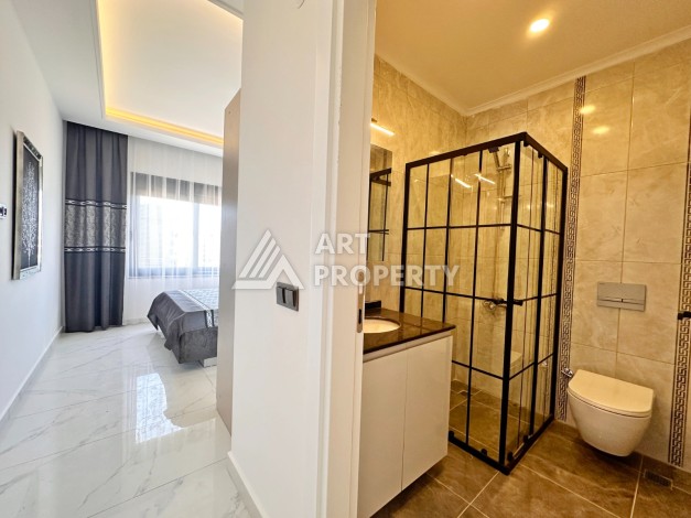 Квартира 2+1 в новом ЖК, 85 кв.м. Каргыджак, Алания - Ракурс 12