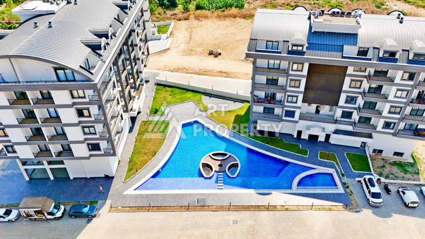 Квартира 2+1 в новом ЖК, 85 кв.м. Каргыджак, Алания - Ракурс 17