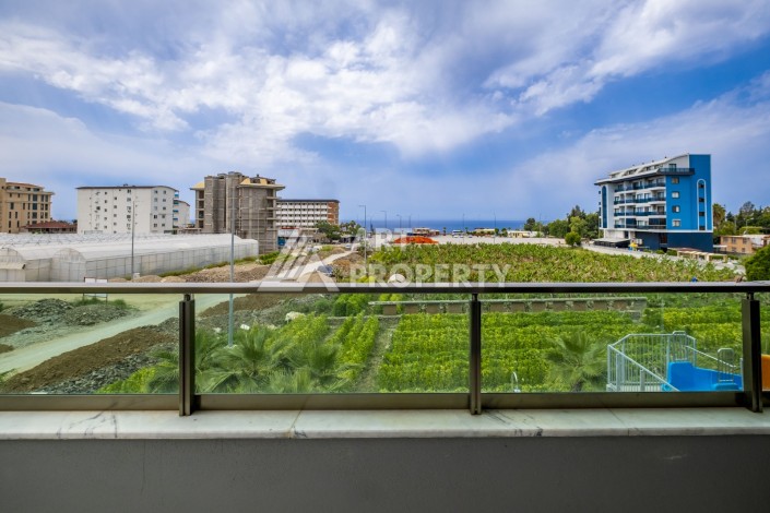 Стильная квартира 2+1 с видом на море, 100 кв.м. Каргыджак, Алания - Ракурс 11