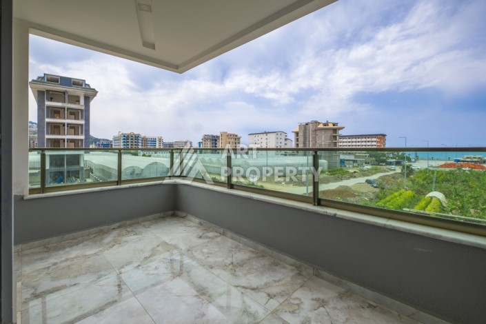 Стильная квартира 2+1 с видом на море, 100 кв.м. Каргыджак, Алания - Ракурс 13