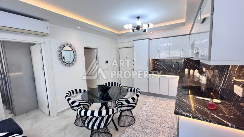 Меблированная квартира1+1 с большим балконом, 70 кв.м. Махмутлар, Алания - Ракурс 2