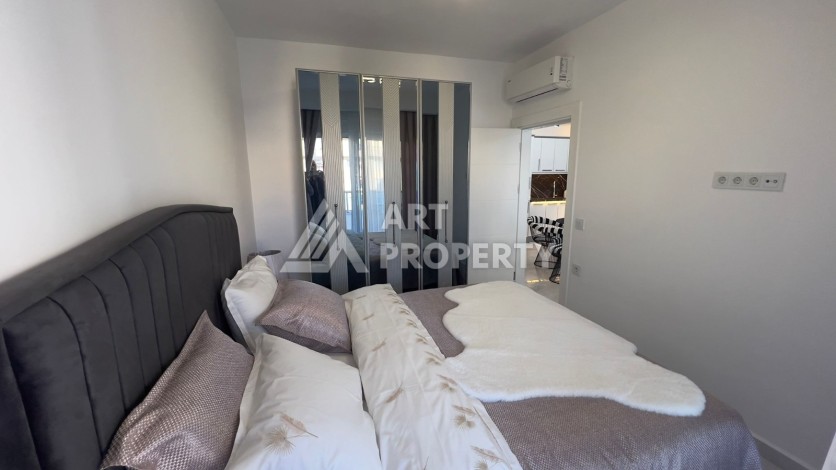 Меблированная квартира1+1 с большим балконом, 70 кв.м. Махмутлар, Алания - Ракурс 13