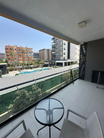 Современная квартира 1+1 в 100 метрах от моря, Тосмур, Алания - Ракурс 16