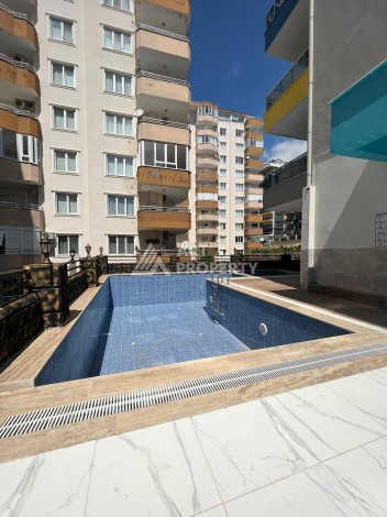 Просторная квартира 1+1 в новом доме, 65 кв.м. Махмутлар, Алания - Ракурс 12