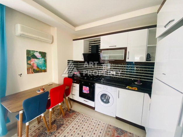 Квартира 1+1 с полной меблировкой в Махмутларе, 60 кы.м. - Ракурс 6