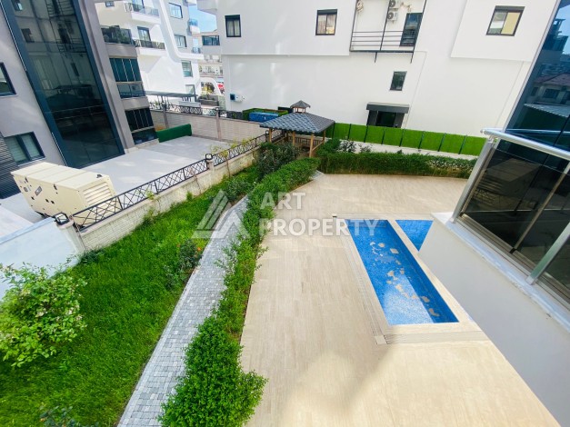 Квартира 1+1 с полной меблировкой в Махмутларе, 60 кы.м. - Ракурс 33