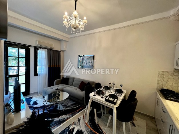 Квартира 1+1 на первой береговой линии в Махмутларе, 50 кв.м. - Ракурс 5