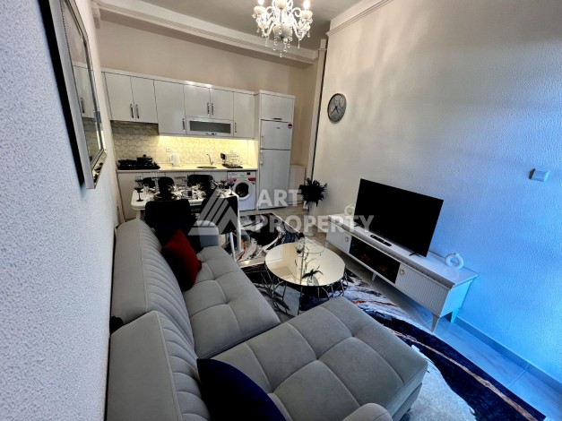 Квартира 1+1 на первой береговой линии в Махмутларе, 50 кв.м. - Ракурс 6