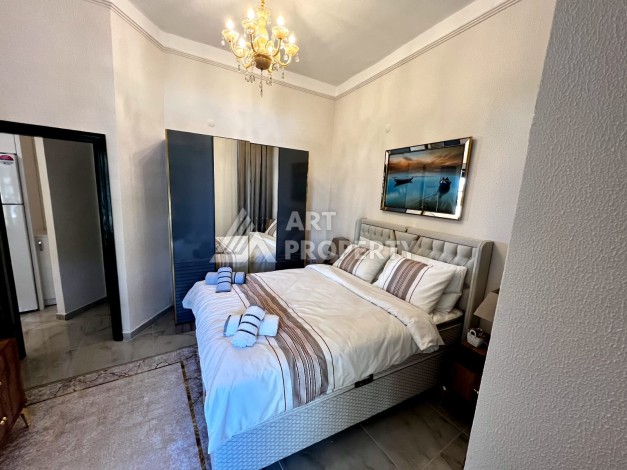 Квартира 1+1 на первой береговой линии в Махмутларе, 50 кв.м. - Ракурс 9