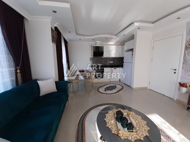 Квартира 1+1 с мебелью, 70 кв.м. в Махмутларе - Ракурс 8