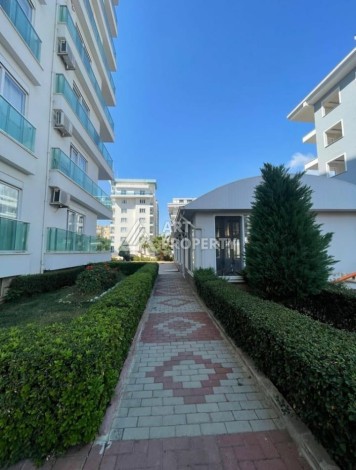 Квартира 1+1 с мебелью, 70 кв.м. в Махмутларе - Ракурс 25