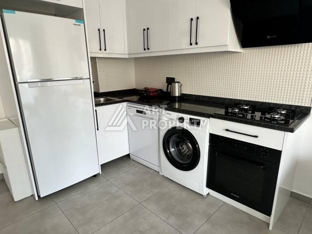 Квартира 1+1 в престижном комплексе района Махмутлар, 60 кв.м. - Ракурс 19