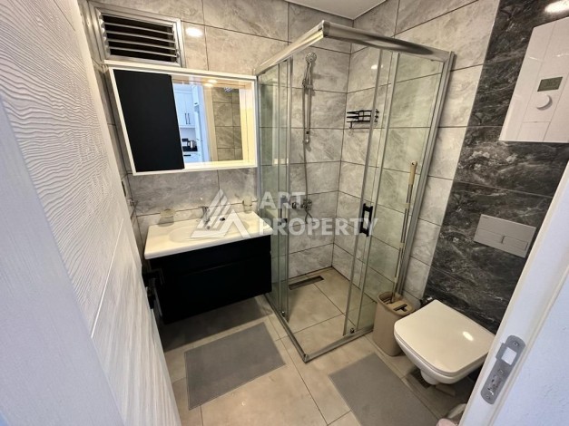 Квартира 1+1 в престижном комплексе района Махмутлар, 60 кв.м. - Ракурс 24