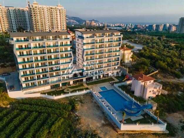 Квартира 1+1 в престижном комплексе района Махмутлар, 60 кв.м. - Ракурс 29