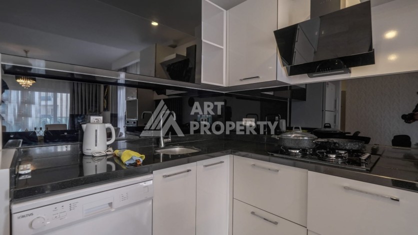 Квартира 1+1 с мебелью в Махмутларе, 70 кв.м. - Ракурс 5