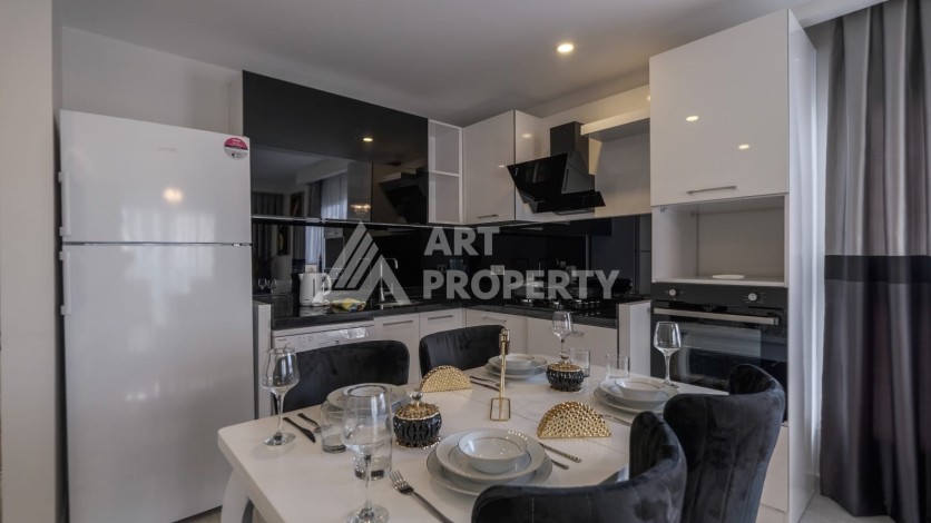 Квартира 1+1 с мебелью в Махмутларе, 70 кв.м. - Ракурс 6