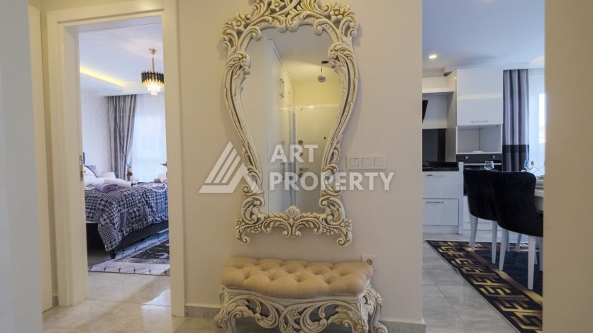 Квартира 1+1 с мебелью в Махмутларе, 70 кв.м. - Ракурс 7