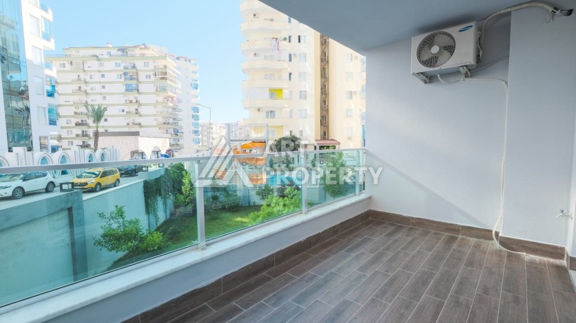 Квартира 1+1 с мебелью в Махмутларе, 70 кв.м. - Ракурс 8