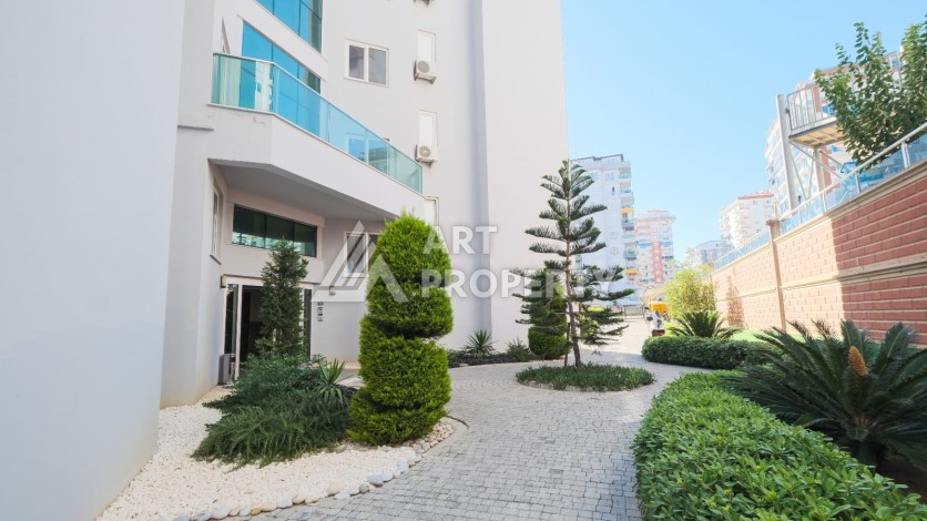 Квартира 1+1 с мебелью в Махмутларе, 70 кв.м. - Ракурс 18