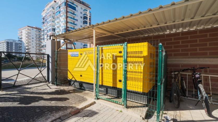 Квартира 1+1 с мебелью в Махмутларе, 70 кв.м. - Ракурс 19