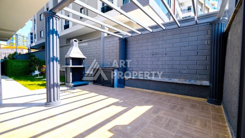 Квартира 1+1 в Махмутларе рядом с Наулой, 55 кв.м. - Ракурс 12