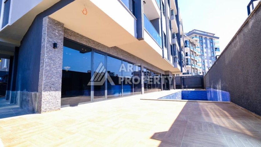 Квартира 1+1 в Махмутларе рядом с Наулой, 55 кв.м. - Ракурс 14