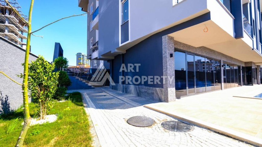 Квартира 1+1 в Махмутларе рядом с Наулой, 55 кв.м. - Ракурс 23