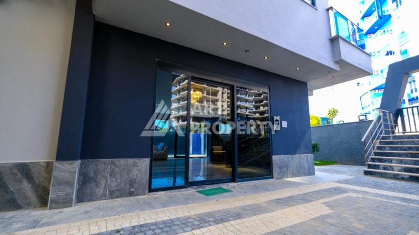 Квартира 1+1 в Махмутларе рядом с Наулой, 55 кв.м. - Ракурс 25