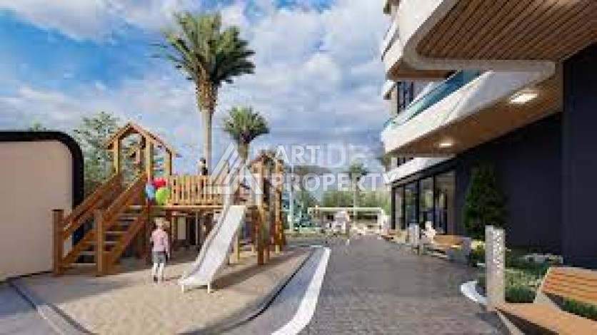 Стильная квартира 1+1 в элитном жилом комплексе в центре Махмутлара, 52 кв.м. - Ракурс 11