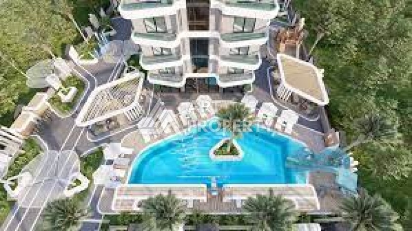 Стильная квартира 1+1 в элитном жилом комплексе в центре Махмутлара, 52 кв.м. - Ракурс 16