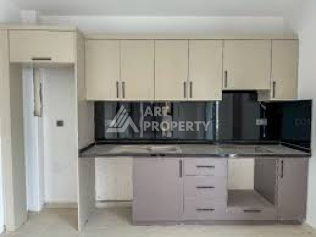 Стильная квартира 1+1 в элитном жилом комплексе в центре Махмутлара, 52 кв.м. - Ракурс 31