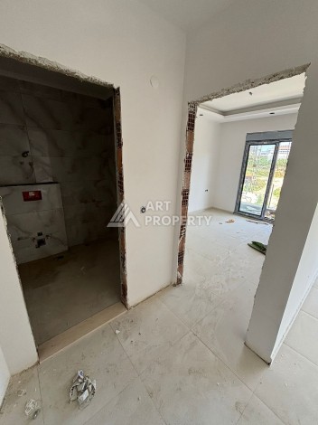 Стильная квартира 1+1 в элитном жилом комплексе в центре Махмутлара, 52 кв.м. - Ракурс 36