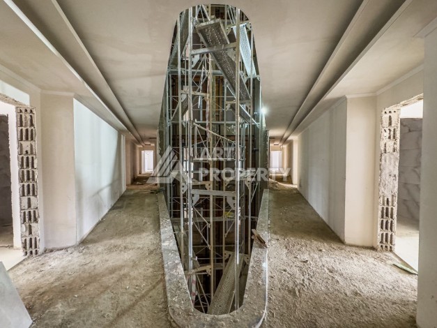 Стильная квартира 1+1 в элитном жилом комплексе в центре Махмутлара, 52 кв.м. - Ракурс 37