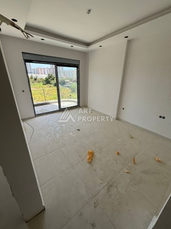 Стильная квартира 1+1 в элитном жилом комплексе в центре Махмутлара, 52 кв.м. - Ракурс 39