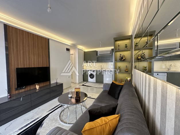 Квартира 1+1 на первой линии в Махмутларе, 50 кв.м. - Ракурс 2