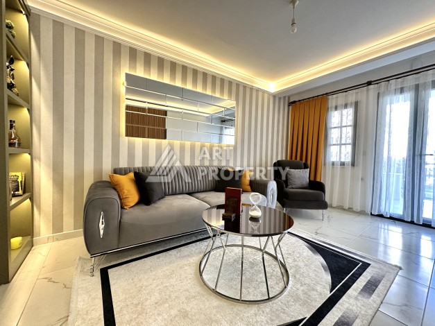 Квартира 1+1 на первой линии в Махмутларе, 50 кв.м. - Ракурс 4